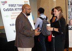 Second VP Rob Knox of Towson visits with first time CoSIDA attendees.